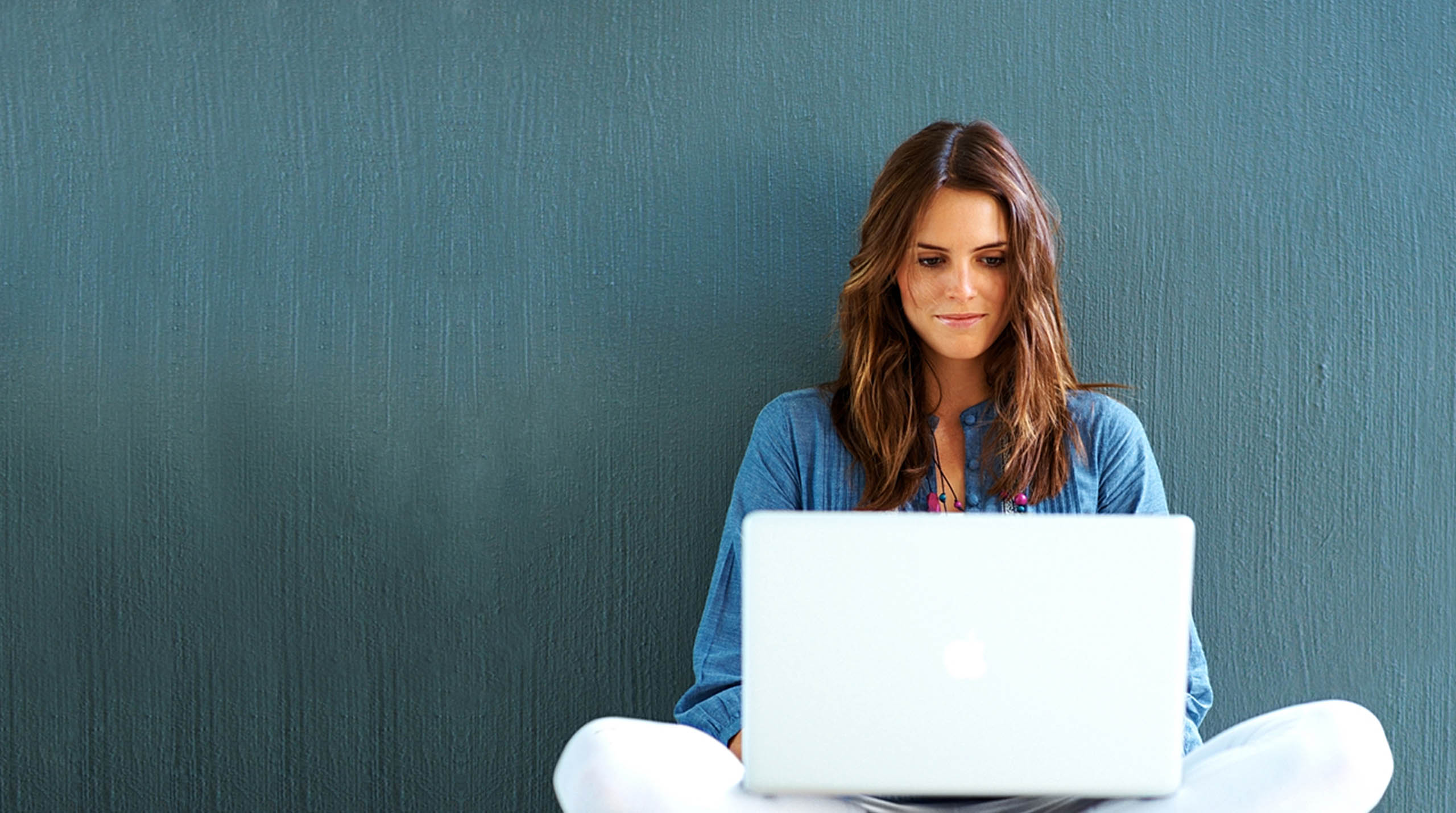 women with laptop Complaints Board: Global UX/UI Redesign Case Study