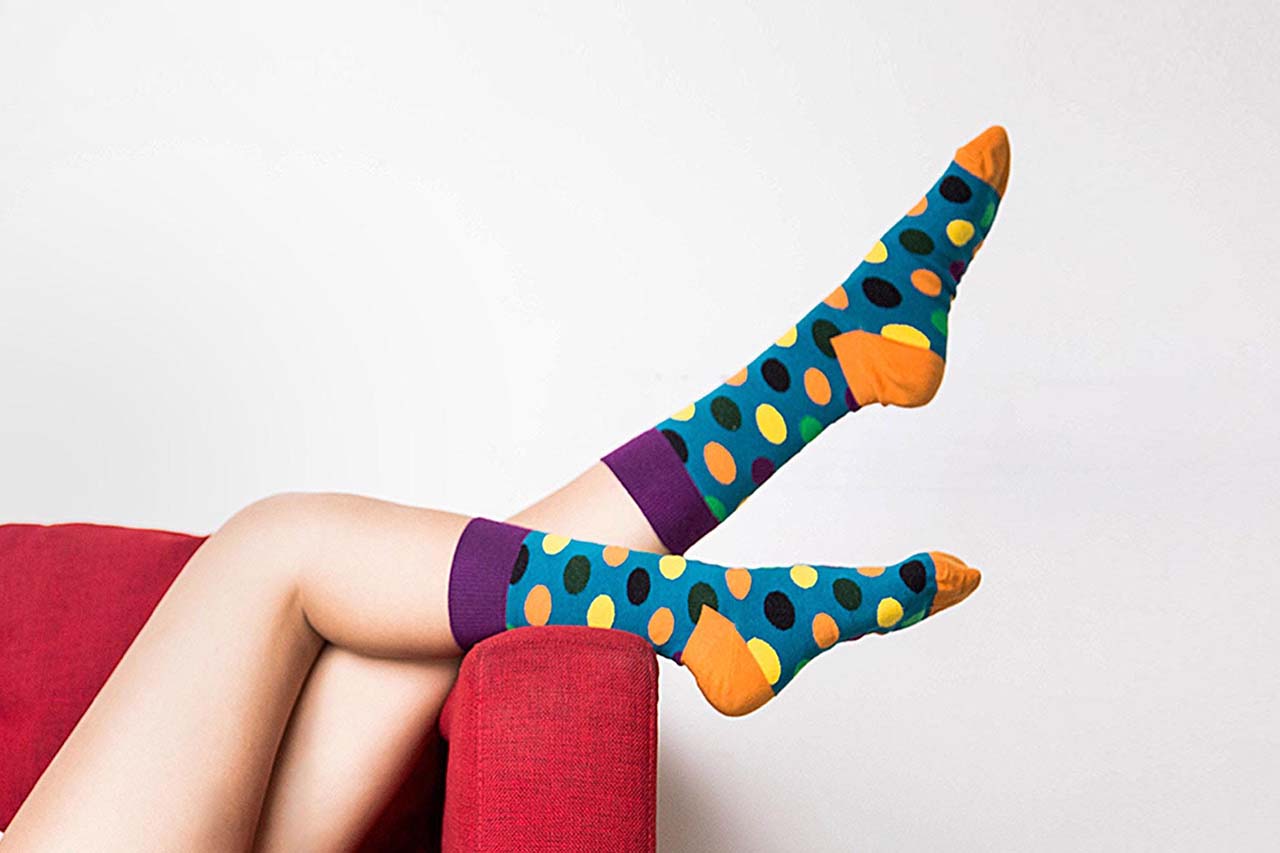 Woman in socks on the sofa, Nasocks eCommerce Web Design for Online Store
