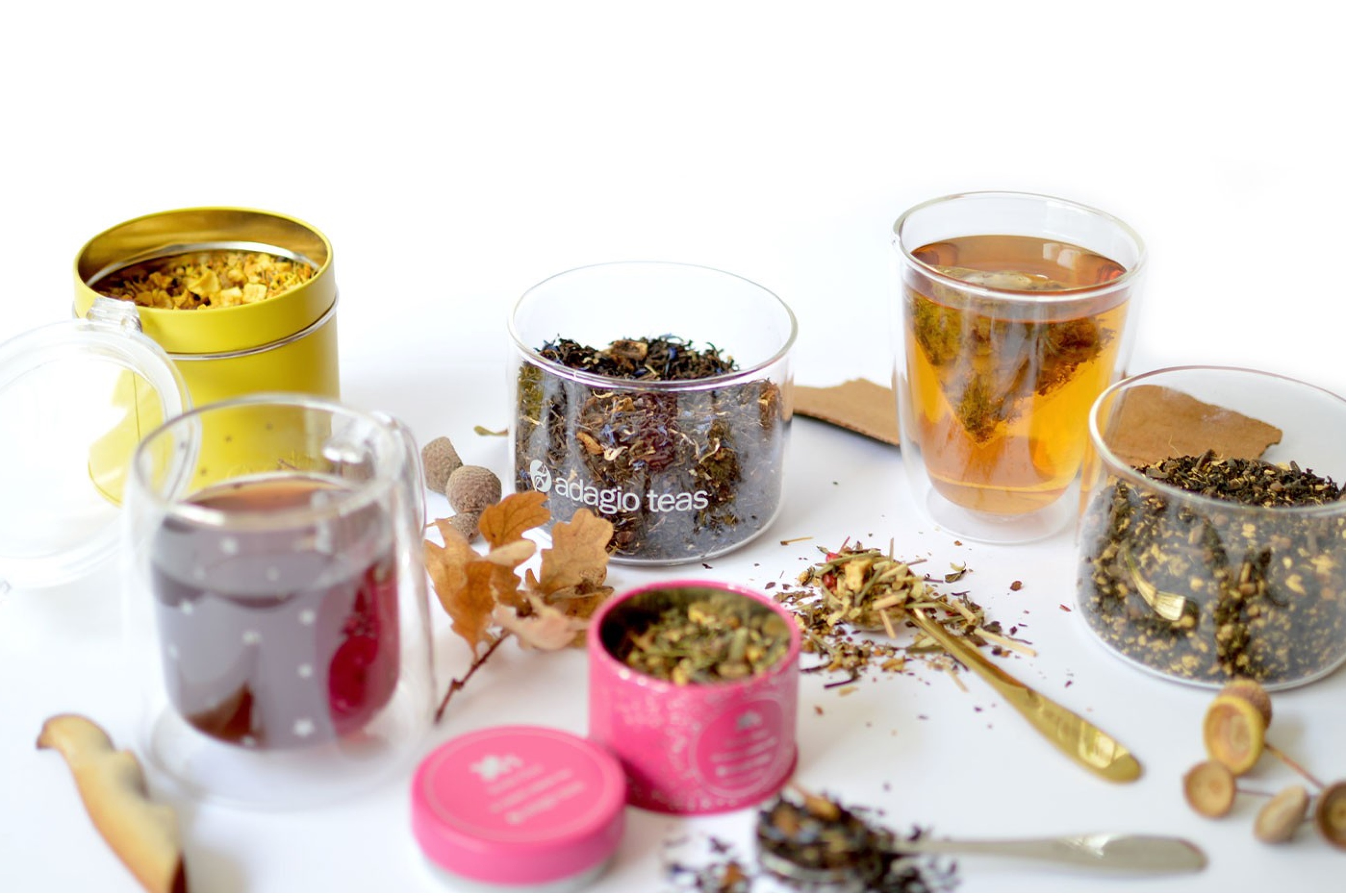 Various tea containers and brewed tea adagio teas