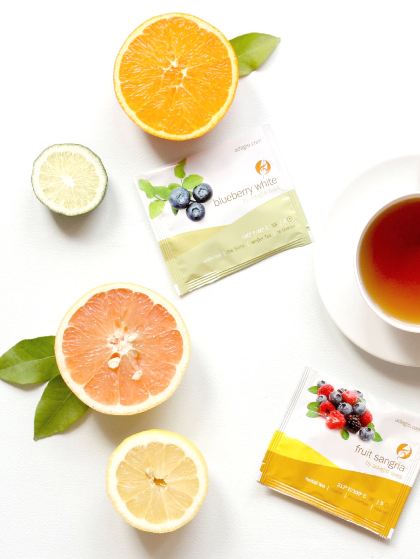 Citrus fruits and tea packaging displayed