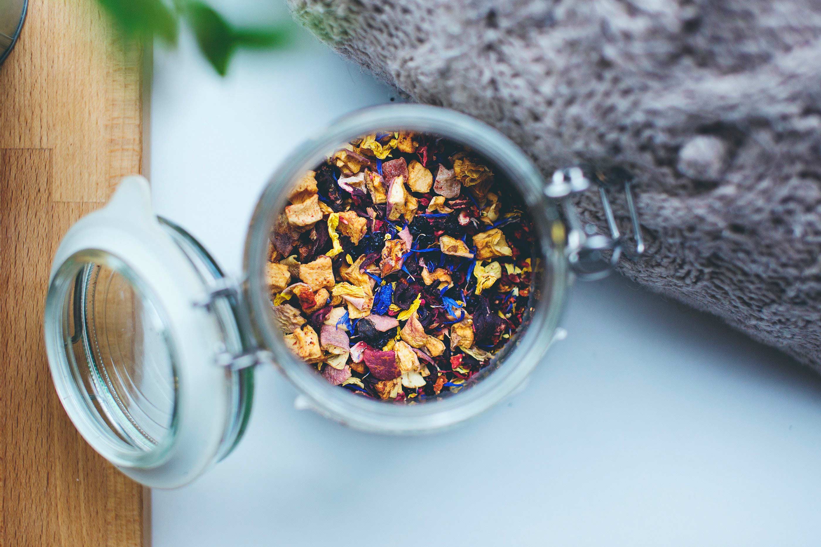 Colorful dried flowers in jar