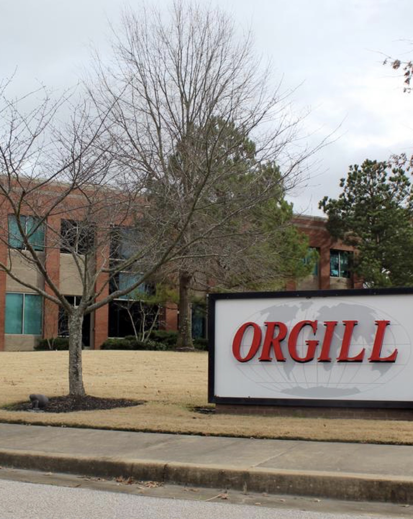 Orgill sign in front of building