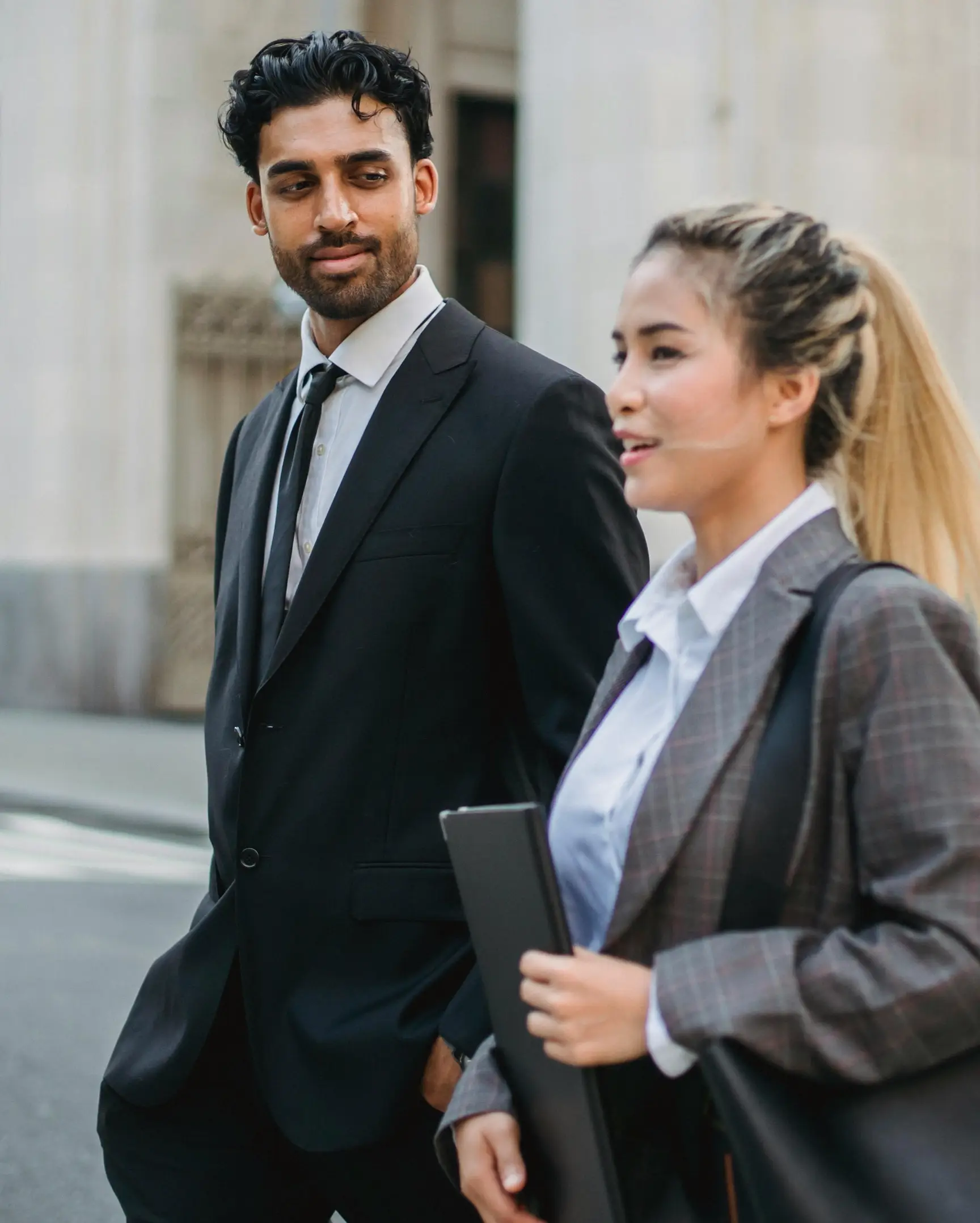 business people waking on the street _ V1CE Client Conversion Platform and Digital Business Cards